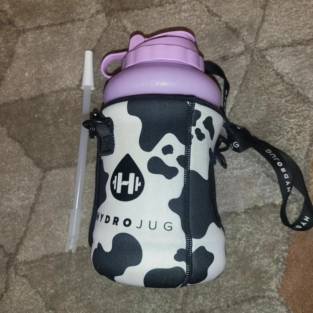 Hydrojug in purple with cow print sleeve and straw